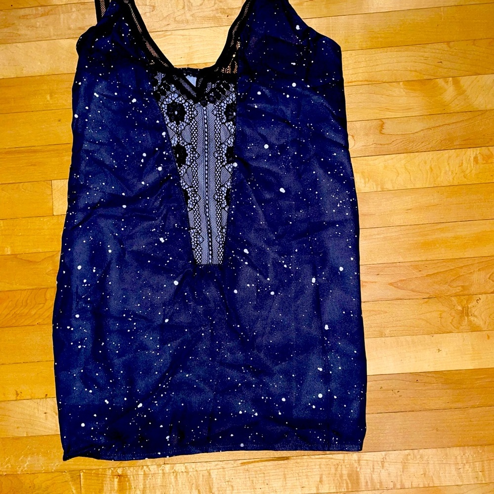 3/$25 Sparkle tank top size LG never worn in new condition.
